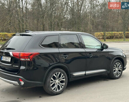 Чорний Міцубісі Аутлендер, об'ємом двигуна 2.36 л та пробігом 169 тис. км за 13450 $, фото 6 на Automoto.ua