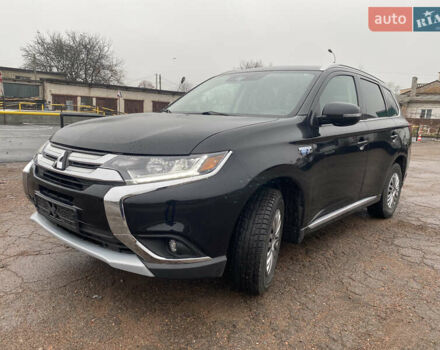 Черный Мицубиси Аутлендер, объемом двигателя 2 л и пробегом 76 тыс. км за 20800 $, фото 5 на Automoto.ua
