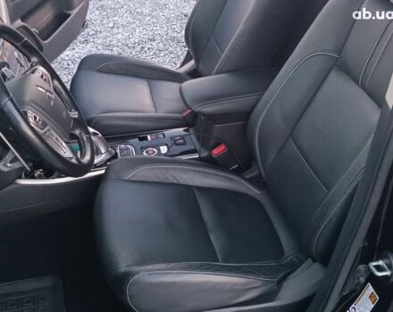 Черный Мицубиси Аутлендер, объемом двигателя 2 л и пробегом 115 тыс. км за 23700 $, фото 27 на Automoto.ua