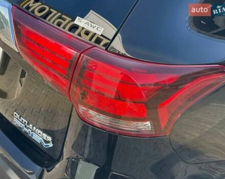 Черный Мицубиси Аутлендер, объемом двигателя 2 л и пробегом 67 тыс. км за 23000 $, фото 17 на Automoto.ua