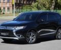 Черный Мицубиси Аутлендер, объемом двигателя 2.4 л и пробегом 130 тыс. км за 16300 $, фото 1 на Automoto.ua