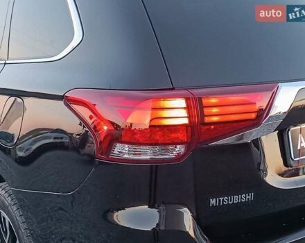 Чорний Міцубісі Аутлендер, об'ємом двигуна 2 л та пробігом 115 тис. км за 23700 $, фото 9 на Automoto.ua
