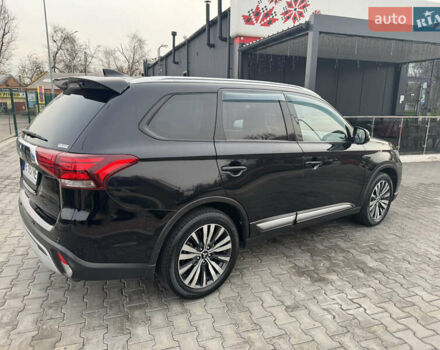 Чорний Міцубісі Аутлендер, об'ємом двигуна 2.36 л та пробігом 53 тис. км за 23500 $, фото 5 на Automoto.ua