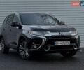 Черный Мицубиси Аутлендер, объемом двигателя 2.4 л и пробегом 53 тыс. км за 17000 $, фото 1 на Automoto.ua