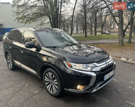 Черный Мицубиси Аутлендер, объемом двигателя 2.36 л и пробегом 67 тыс. км за 19500 $, фото 3 на Automoto.ua