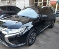 Черный Мицубиси Аутлендер, объемом двигателя 2.4 л и пробегом 82 тыс. км за 17700 $, фото 2 на Automoto.ua