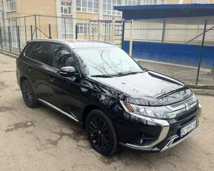 Черный Мицубиси Аутлендер, объемом двигателя 2 л и пробегом 148 тыс. км за 21800 $, фото 4 на Automoto.ua