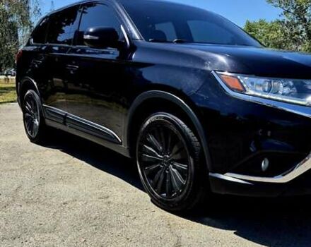 Черный Мицубиси Аутлендер, объемом двигателя 2.36 л и пробегом 200 тыс. км за 17299 $, фото 9 на Automoto.ua