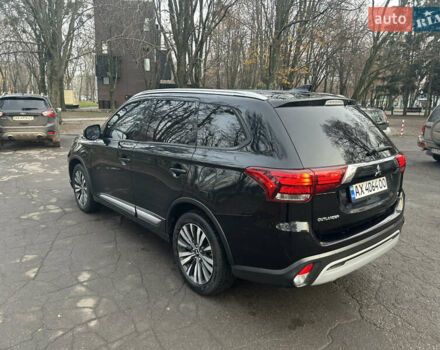 Черный Мицубиси Аутлендер, объемом двигателя 2.36 л и пробегом 67 тыс. км за 19500 $, фото 2 на Automoto.ua