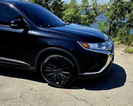 Черный Мицубиси Аутлендер, объемом двигателя 2.36 л и пробегом 200 тыс. км за 17299 $, фото 12 на Automoto.ua