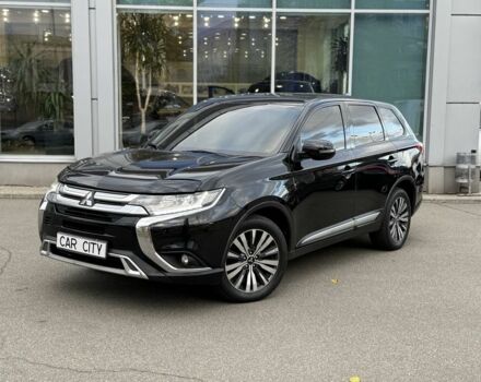 Чорний Міцубісі Аутлендер, об'ємом двигуна 2.4 л та пробігом 107 тис. км за 16250 $, фото 1 на Automoto.ua