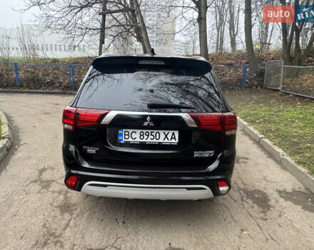 Черный Мицубиси Аутлендер, объемом двигателя 2 л и пробегом 148 тыс. км за 21800 $, фото 9 на Automoto.ua
