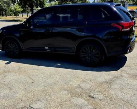 Черный Мицубиси Аутлендер, объемом двигателя 2.36 л и пробегом 200 тыс. км за 17299 $, фото 5 на Automoto.ua