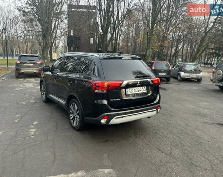 Черный Мицубиси Аутлендер, объемом двигателя 2.36 л и пробегом 67 тыс. км за 19500 $, фото 4 на Automoto.ua