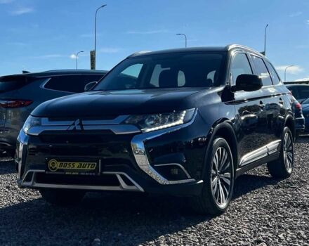 Чорний Міцубісі Аутлендер, об'ємом двигуна 2.4 л та пробігом 97 тис. км за 17700 $, фото 2 на Automoto.ua