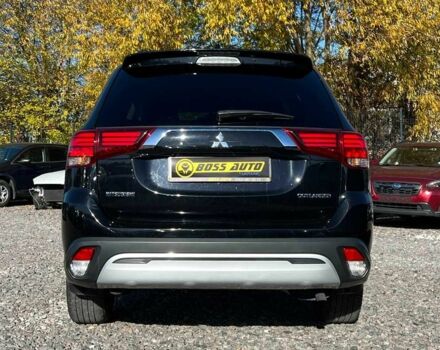 Чорний Міцубісі Аутлендер, об'ємом двигуна 2.4 л та пробігом 97 тис. км за 17700 $, фото 4 на Automoto.ua