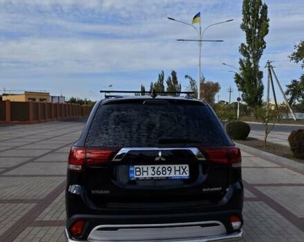 Чорний Міцубісі Аутлендер, об'ємом двигуна 2 л та пробігом 86 тис. км за 18000 $, фото 9 на Automoto.ua