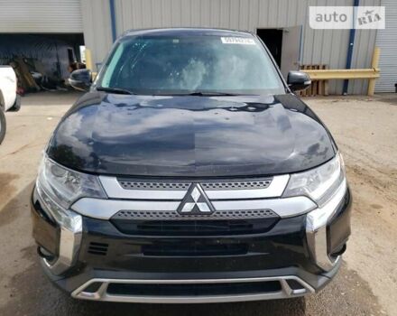 Черный Мицубиси Аутлендер, объемом двигателя 2.36 л и пробегом 135 тыс. км за 2800 $, фото 3 на Automoto.ua