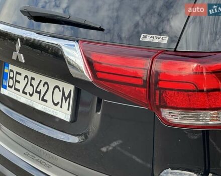 Черный Мицубиси Аутлендер, объемом двигателя 2.36 л и пробегом 90 тыс. км за 26500 $, фото 8 на Automoto.ua