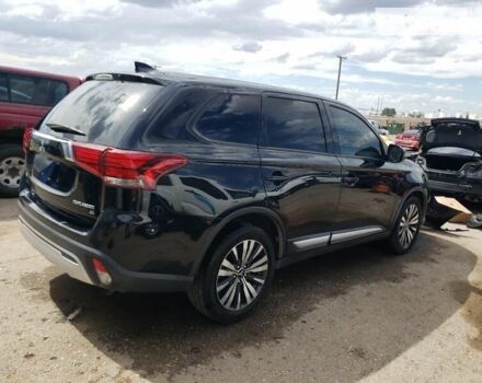 Черный Мицубиси Аутлендер, объемом двигателя 2.36 л и пробегом 135 тыс. км за 2800 $, фото 2 на Automoto.ua