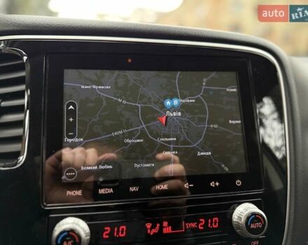 Черный Мицубиси Аутлендер, объемом двигателя 2 л и пробегом 65 тыс. км за 19950 $, фото 37 на Automoto.ua