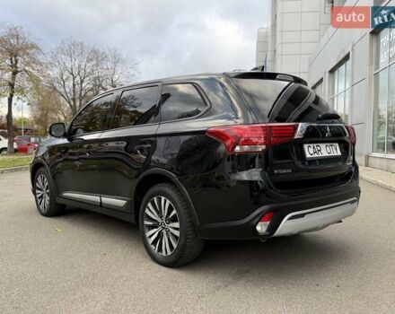 Чорний Міцубісі Аутлендер, об'ємом двигуна 2.36 л та пробігом 106 тис. км за 16250 $, фото 4 на Automoto.ua