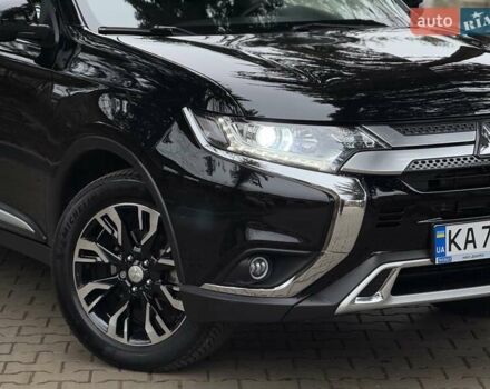 Черный Мицубиси Аутлендер, объемом двигателя 2 л и пробегом 65 тыс. км за 19950 $, фото 4 на Automoto.ua