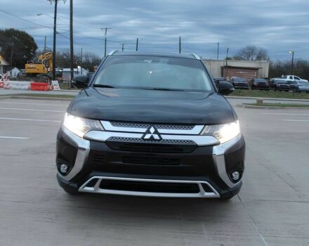 Черный Мицубиси Аутлендер, объемом двигателя 3 л и пробегом 43 тыс. км за 6400 $, фото 1 на Automoto.ua