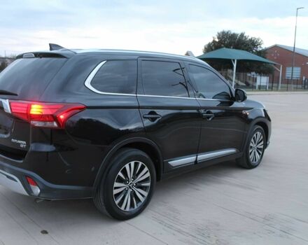 Черный Мицубиси Аутлендер, объемом двигателя 3 л и пробегом 43 тыс. км за 6400 $, фото 4 на Automoto.ua