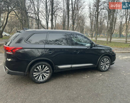 Черный Мицубиси Аутлендер, объемом двигателя 2.36 л и пробегом 67 тыс. км за 19500 $, фото 6 на Automoto.ua