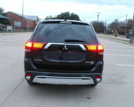 Черный Мицубиси Аутлендер, объемом двигателя 3 л и пробегом 43 тыс. км за 6400 $, фото 5 на Automoto.ua