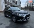 Чорний Міцубісі Аутлендер, об'ємом двигуна 2.36 л та пробігом 132 тис. км за 15900 $, фото 1 на Automoto.ua