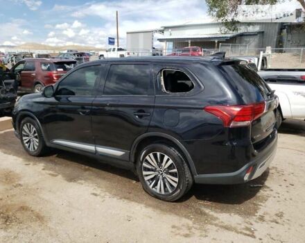 Черный Мицубиси Аутлендер, объемом двигателя 2.36 л и пробегом 135 тыс. км за 2800 $, фото 1 на Automoto.ua