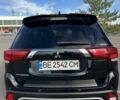 Черный Мицубиси Аутлендер, объемом двигателя 2.36 л и пробегом 90 тыс. км за 26500 $, фото 6 на Automoto.ua