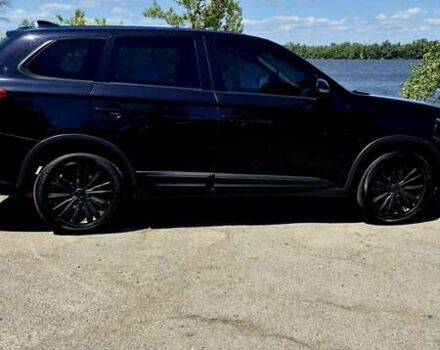 Черный Мицубиси Аутлендер, объемом двигателя 2.36 л и пробегом 200 тыс. км за 17299 $, фото 13 на Automoto.ua