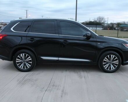 Черный Мицубиси Аутлендер, объемом двигателя 3 л и пробегом 43 тыс. км за 6400 $, фото 7 на Automoto.ua