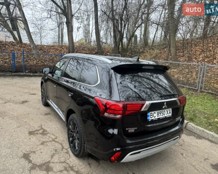 Черный Мицубиси Аутлендер, объемом двигателя 2 л и пробегом 148 тыс. км за 21800 $, фото 10 на Automoto.ua