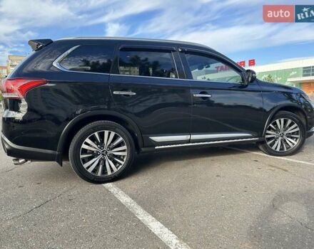 Черный Мицубиси Аутлендер, объемом двигателя 2.36 л и пробегом 90 тыс. км за 26500 $, фото 4 на Automoto.ua