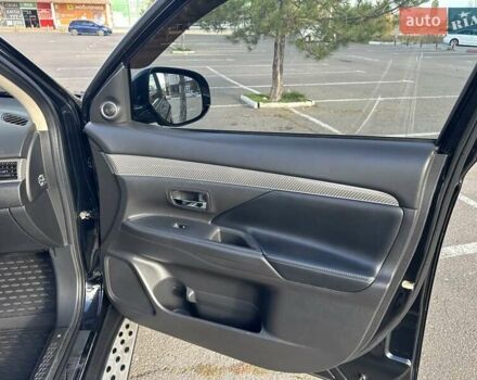 Черный Мицубиси Аутлендер, объемом двигателя 2.36 л и пробегом 90 тыс. км за 26500 $, фото 49 на Automoto.ua