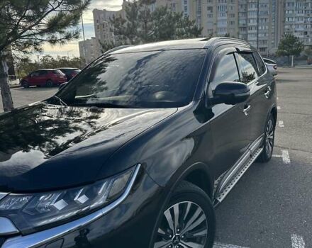 Черный Мицубиси Аутлендер, объемом двигателя 2.36 л и пробегом 90 тыс. км за 26500 $, фото 3 на Automoto.ua