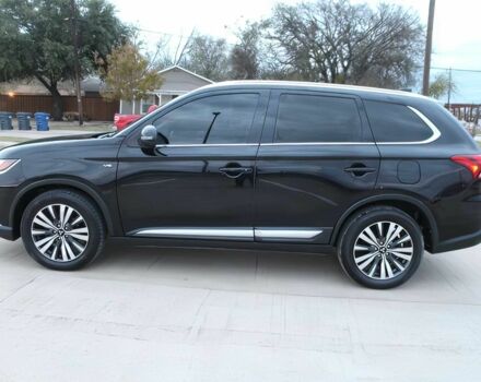 Черный Мицубиси Аутлендер, объемом двигателя 3 л и пробегом 43 тыс. км за 6400 $, фото 3 на Automoto.ua