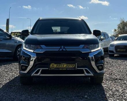 Чорний Міцубісі Аутлендер, об'ємом двигуна 2.4 л та пробігом 97 тис. км за 17700 $, фото 1 на Automoto.ua