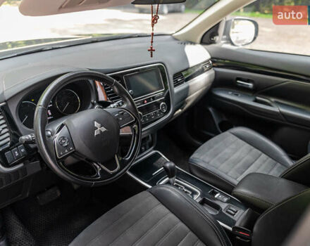 Черный Мицубиси Аутлендер, объемом двигателя 2.4 л и пробегом 56 тыс. км за 18500 $, фото 21 на Automoto.ua