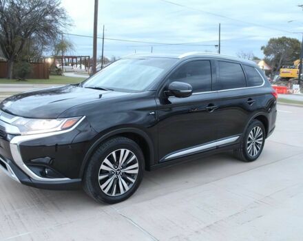 Черный Мицубиси Аутлендер, объемом двигателя 3 л и пробегом 43 тыс. км за 6400 $, фото 2 на Automoto.ua