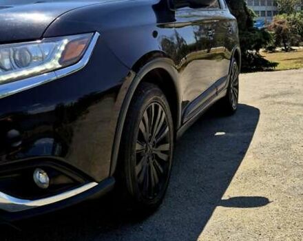 Черный Мицубиси Аутлендер, объемом двигателя 2.36 л и пробегом 200 тыс. км за 17299 $, фото 3 на Automoto.ua