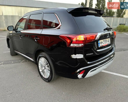 Чорний Міцубісі Аутлендер, об'ємом двигуна 2.36 л та пробігом 66 тис. км за 19800 $, фото 9 на Automoto.ua