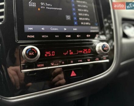 Черный Мицубиси Аутлендер, объемом двигателя 2 л и пробегом 65 тыс. км за 19950 $, фото 31 на Automoto.ua