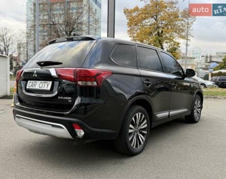 Чорний Міцубісі Аутлендер, об'ємом двигуна 2.36 л та пробігом 106 тис. км за 16250 $, фото 6 на Automoto.ua