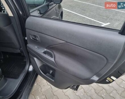 Черный Мицубиси Аутлендер, объемом двигателя 2.36 л и пробегом 127 тыс. км за 20800 $, фото 42 на Automoto.ua