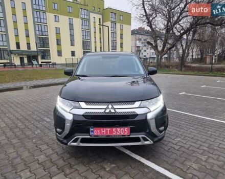 Черный Мицубиси Аутлендер, объемом двигателя 2.36 л и пробегом 127 тыс. км за 20800 $, фото 1 на Automoto.ua